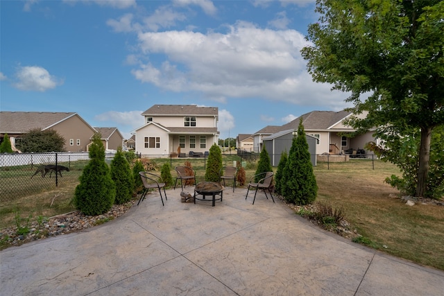 view of patio / terrace with a fire pit