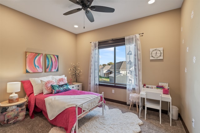 carpeted bedroom featuring ceiling fan