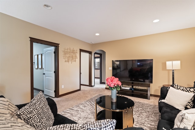 living room with light colored carpet