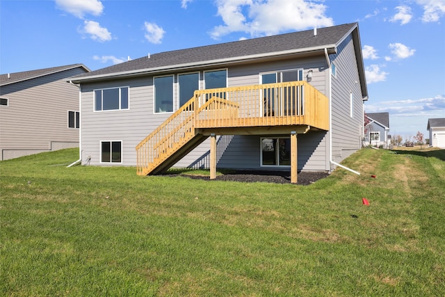 back of house with a deck and a lawn