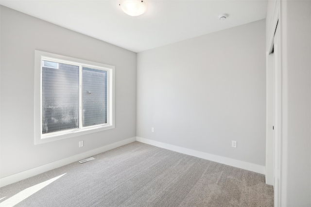 unfurnished bedroom with carpet flooring