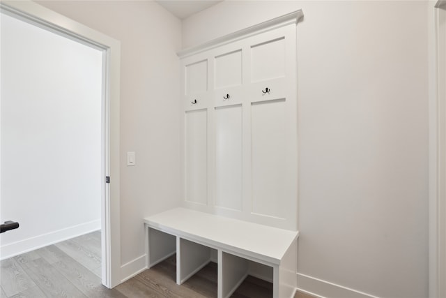 mudroom with light hardwood / wood-style floors