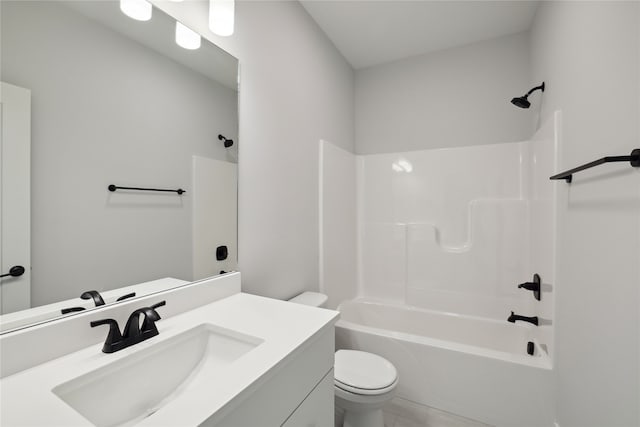 full bathroom featuring vanity, toilet, washtub / shower combination, and tile patterned flooring