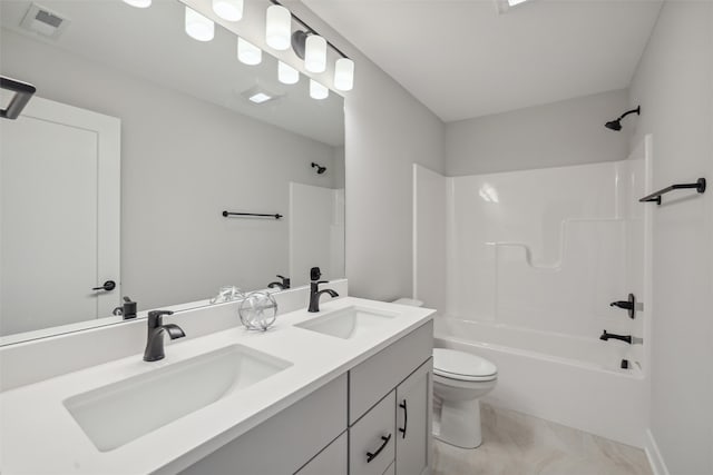 full bathroom featuring bathtub / shower combination, vanity, and toilet