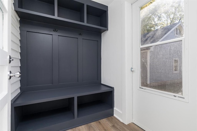 mudroom with wood finished floors