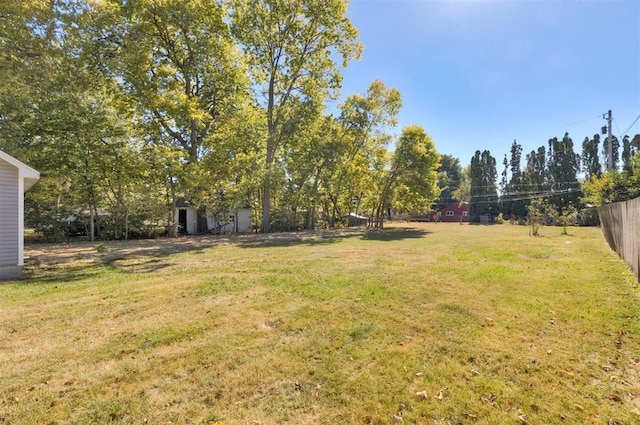 view of yard with fence