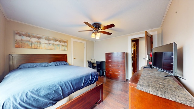 bedroom with ceiling fan, hardwood / wood-style flooring, and ornamental molding