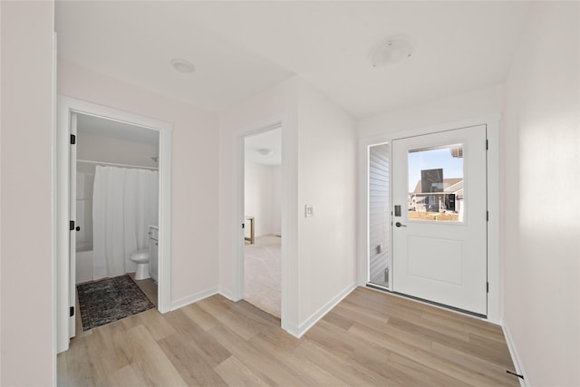 entrance foyer with light wood-type flooring