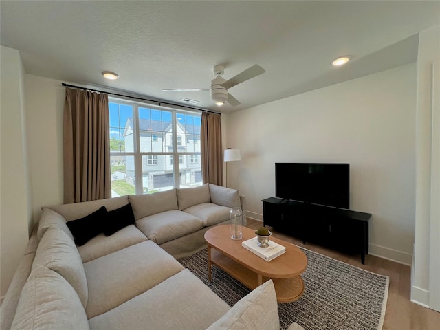 4424 154th St, Urbandale, IA 50323 - living room featuring wood finished floors, a ceiling fan, and recessed lighting