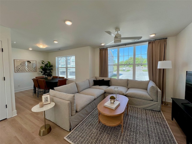 4424 154th St, Urbandale, IA 50323 - living area featuring light wood-type flooring, ceiling fan, and recessed lighting