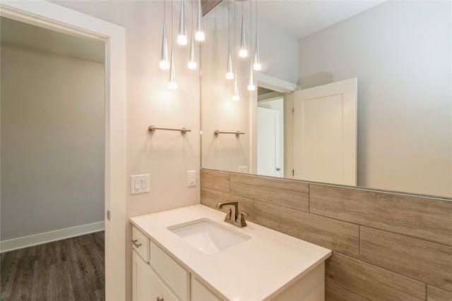 bathroom with vanity and hardwood / wood-style floors