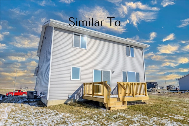 snow covered property with a lawn and cooling unit