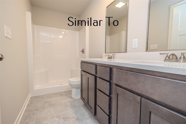 full bathroom with toilet, a sink, baseboards, a shower, and double vanity