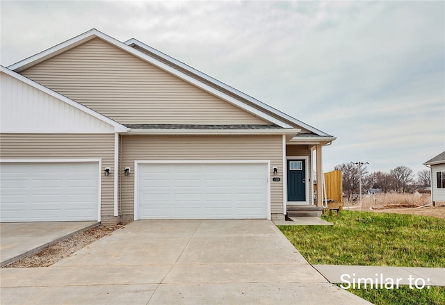 view of front of property featuring a garage