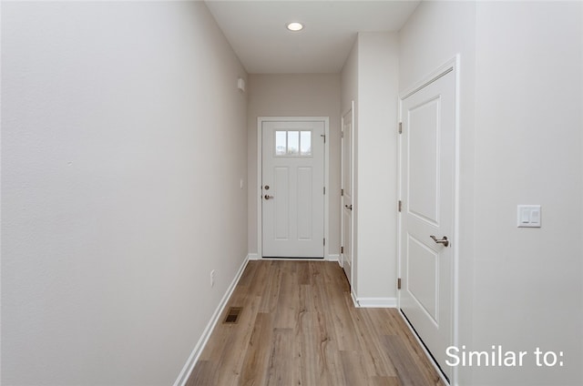 doorway featuring light hardwood / wood-style floors