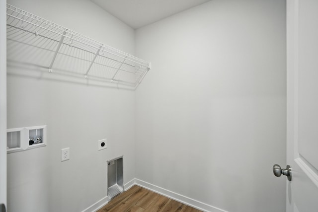 clothes washing area featuring hookup for an electric dryer, baseboards, hookup for a washing machine, dark wood-style flooring, and laundry area