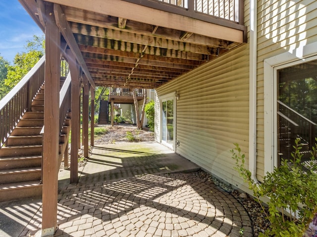 view of patio with a wooden deck