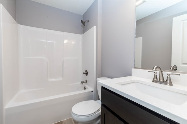 full bathroom featuring vanity, toilet, and bathing tub / shower combination