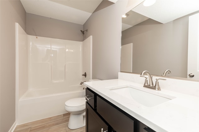 full bathroom with vanity, toilet, shower / bath combination, and wood-type flooring