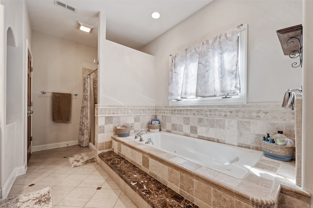 bathroom featuring tile patterned floors, shower with separate bathtub, and tile walls