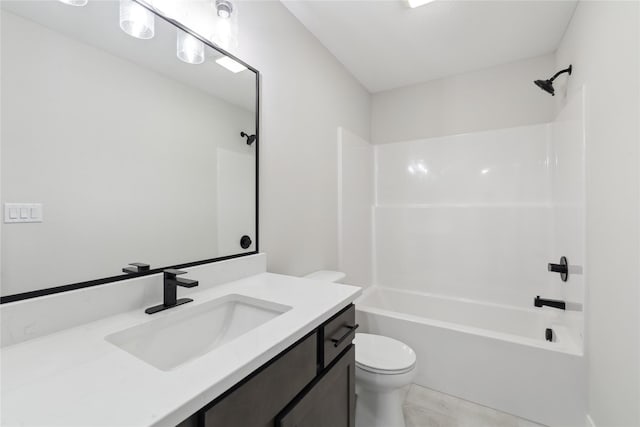 full bathroom with tile patterned floors, vanity, toilet, and shower / washtub combination