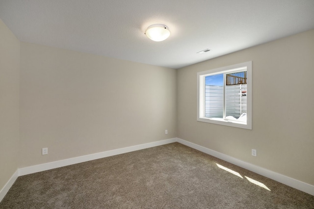 empty room with carpet floors