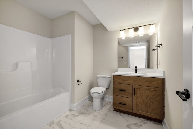 full bathroom with  shower combination, vanity, a textured ceiling, and toilet