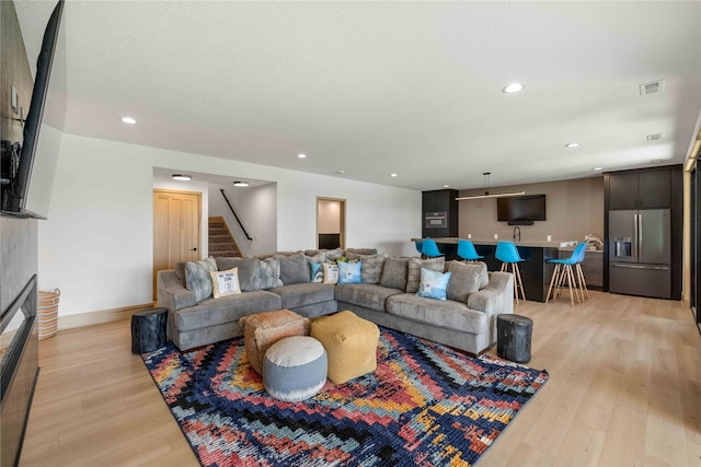 living room featuring light wood-type flooring