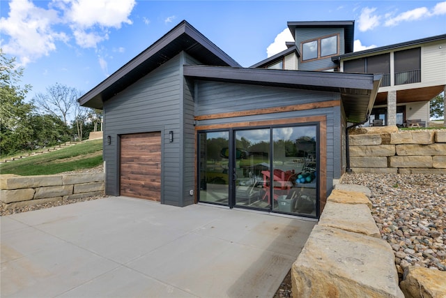 view of home's exterior with a garage