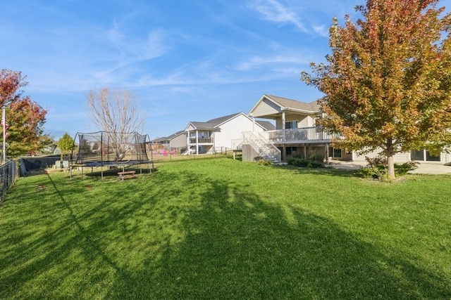 view of yard featuring a trampoline