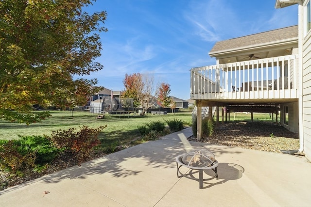 view of patio / terrace with a trampoline and ceiling fan