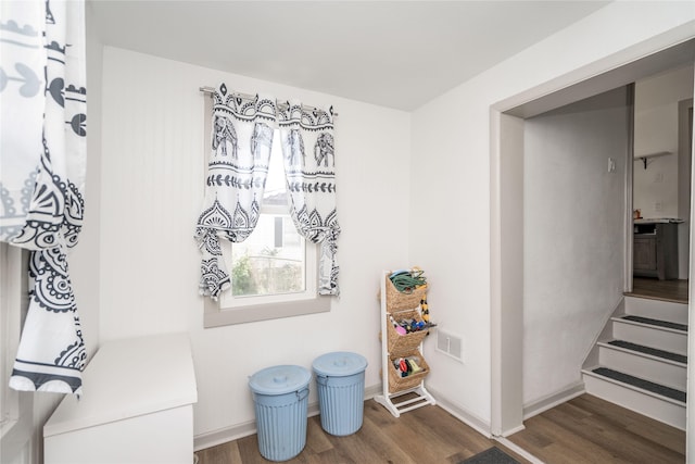 living area with dark wood-type flooring