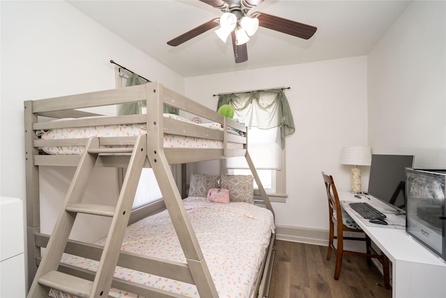 bedroom with wood-type flooring and ceiling fan