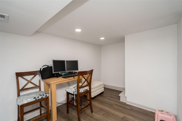 office with dark wood-type flooring