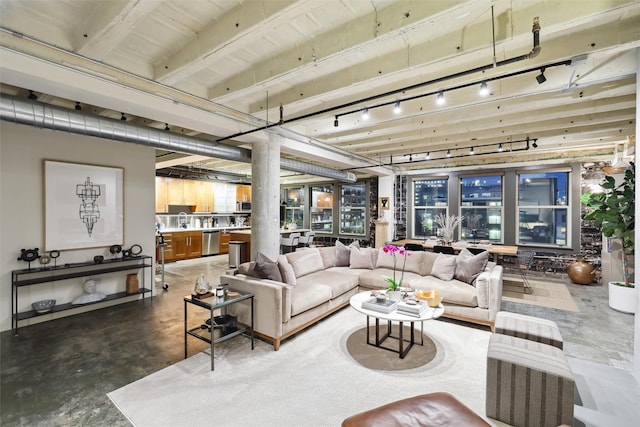 living room with decorative columns