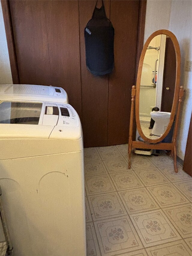 washroom featuring washer / clothes dryer