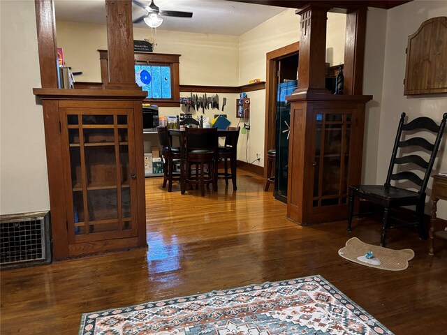 dining space featuring hardwood / wood-style floors and ceiling fan