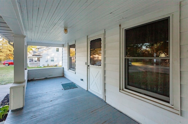 wooden terrace featuring a porch