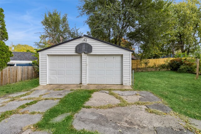 garage with a lawn