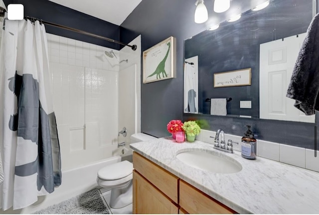 full bathroom with vanity, tile patterned floors, toilet, and shower / bathtub combination with curtain