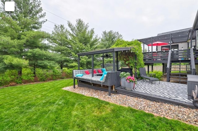 view of yard with a wooden deck