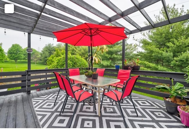 wooden deck featuring a pergola