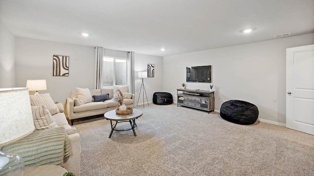 living room featuring light colored carpet