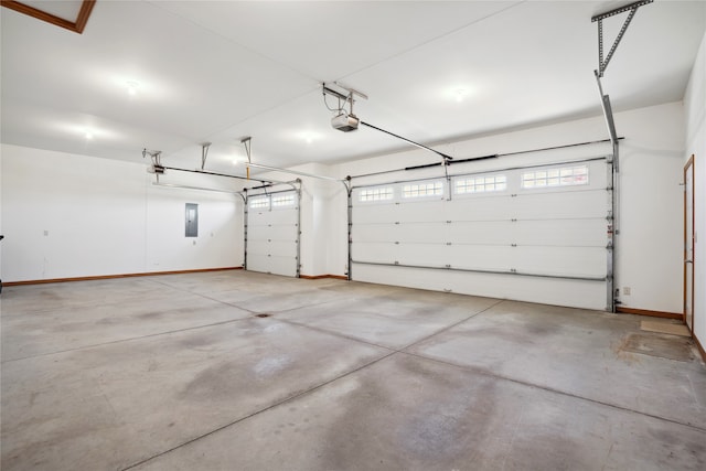 garage featuring a garage door opener and electric panel