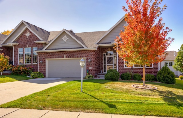 view of front facade with a garage, concrete driveway, brick siding, and a front lawn