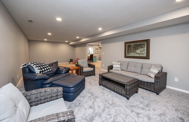 living room with baseboards, visible vents, carpet flooring, and recessed lighting