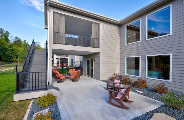 back of house featuring a patio area