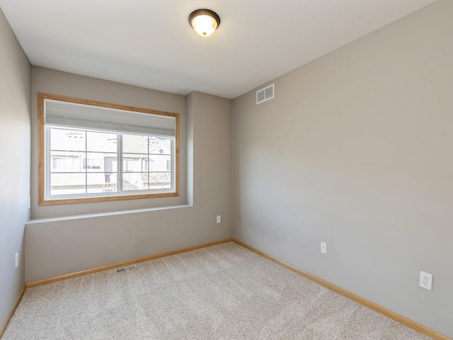 view of carpeted spare room