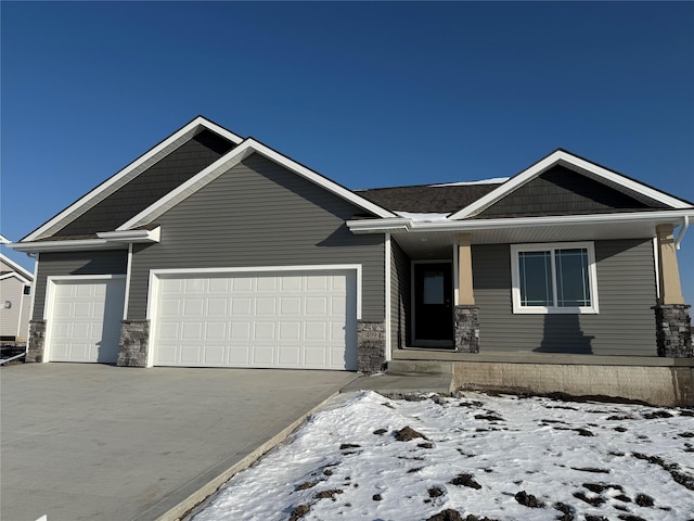 craftsman-style home with a garage