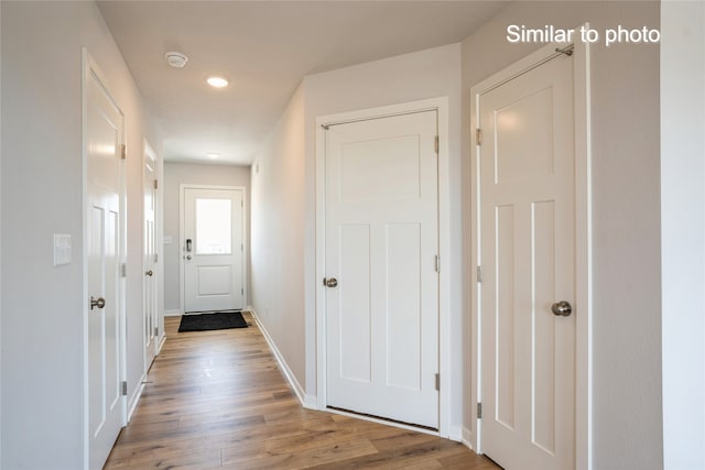 hallway featuring light wood-type flooring